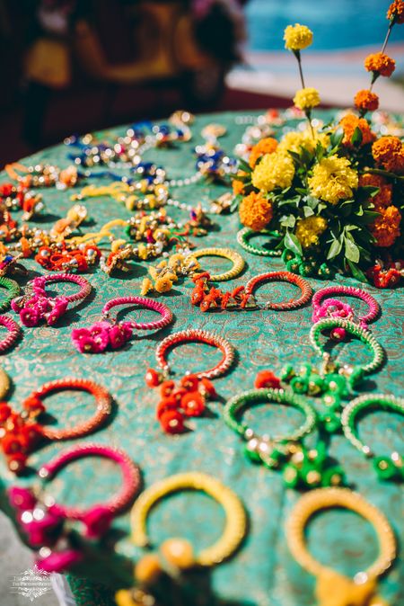 Mehendi favour ideas with colourful gota bangles 