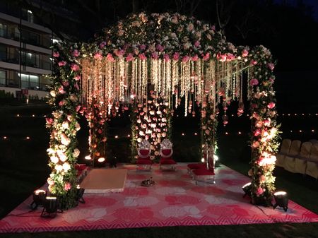 Rose filled mandap in white and green