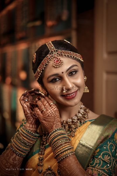 A happy South Indian bride on her wedding day. 