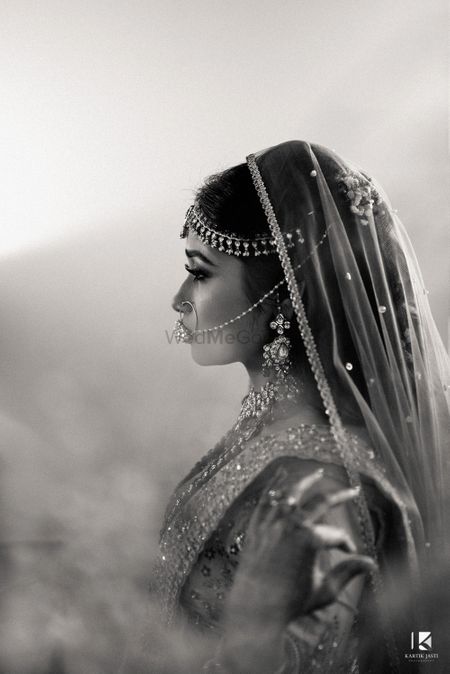 Photo of Black and white side bridal shot