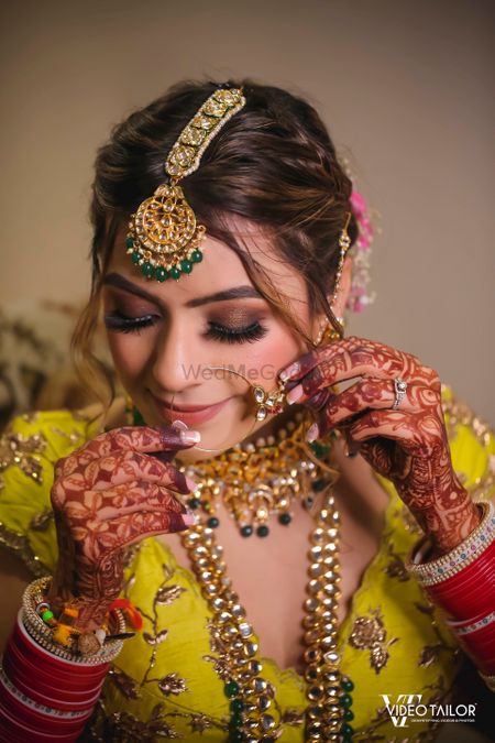 A bride in unique polki and jadau jewelry