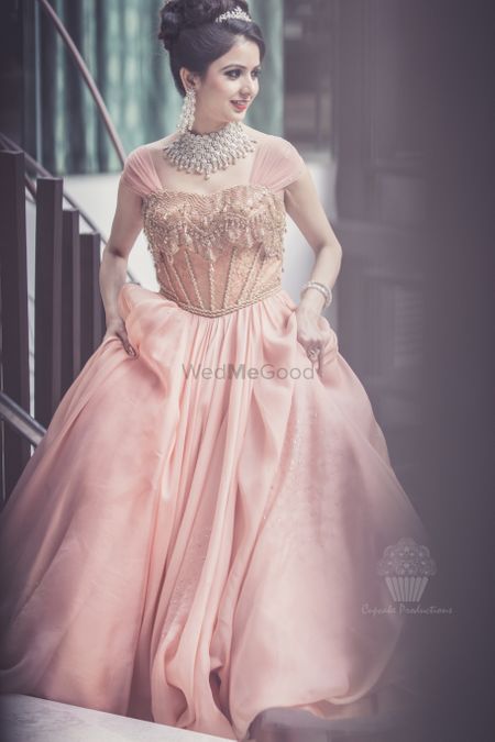 Peach gown worn by bride by Shantanu & nikhil