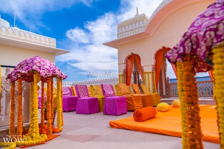 A pop of color mehndi seating idea