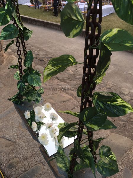 Photo of Swing Decor with Candles and Flowers