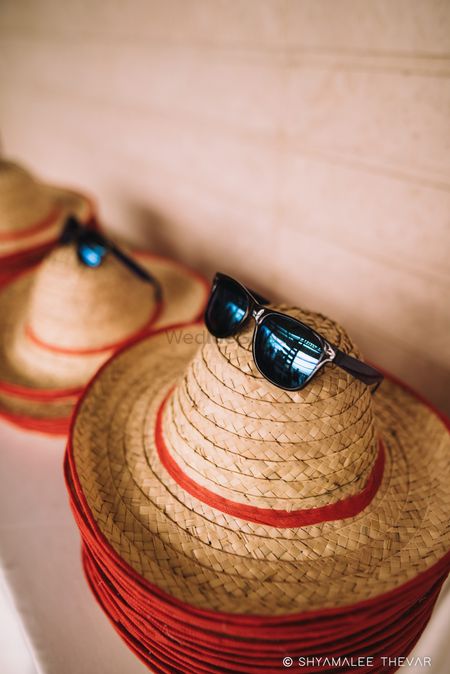 Hats and sunglasses as favours for summer wedding