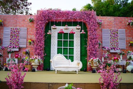 Engagement floral stage decor idea in pink 