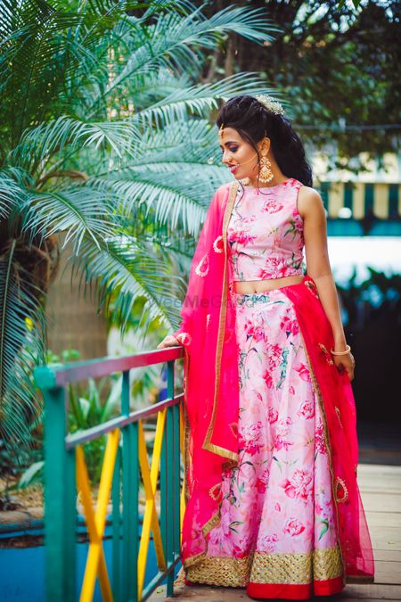 Photo of floral printed pink lehenga for engagement at home