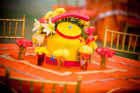 Photo of Teapot and Floral Table Centerpiece