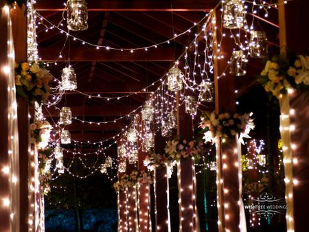 Photo of Fairy Lights Entrance with Floral Decor