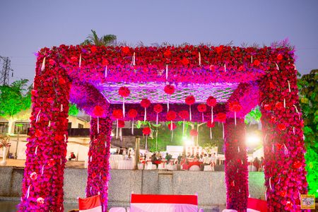 Photo of Mandap with red roses