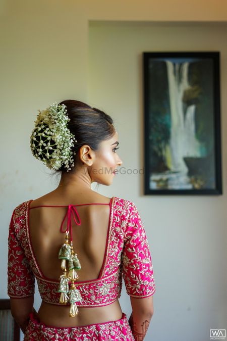 Bridal bun with babys breath all over it 