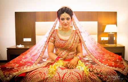Bridal portrait with dupatta flared out