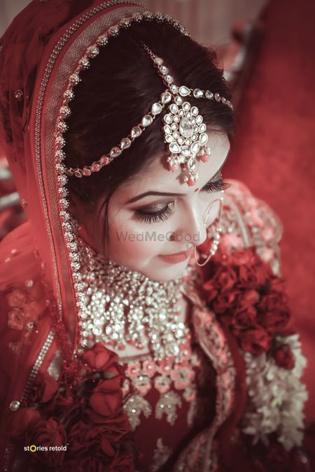 A beautiful bride with subtle makeup and bronze eye-makeup.  