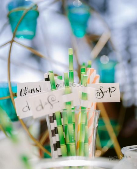 Photo of Personalised straws for pool party with wedding logo