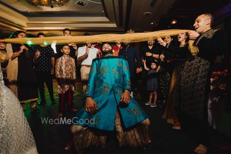 Limbo at sangeet being played by the groom