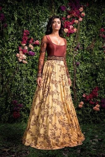 Photo of Mustard and bronxze anarkali gown by Shyamal and Bhumik