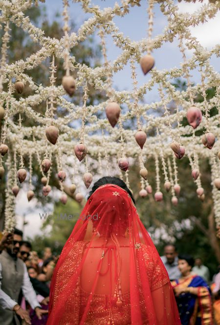 Bride under lotus phoolon ki chadar