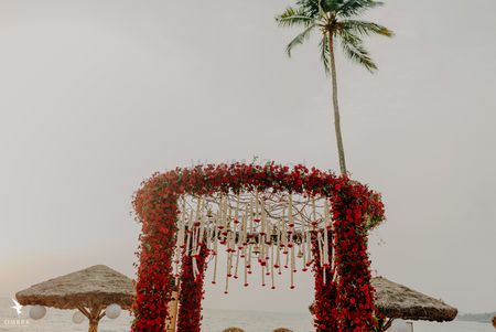 Photo of floral round shaped red mandap