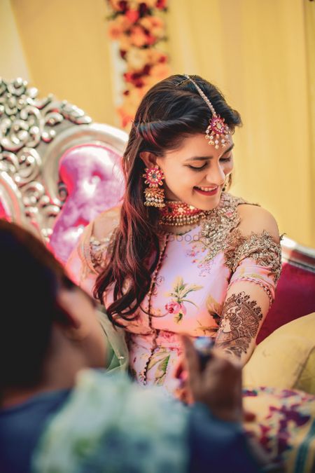 Photo of A to be bride getting her mehndi done