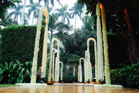 White Floral Poles Entrance Decor