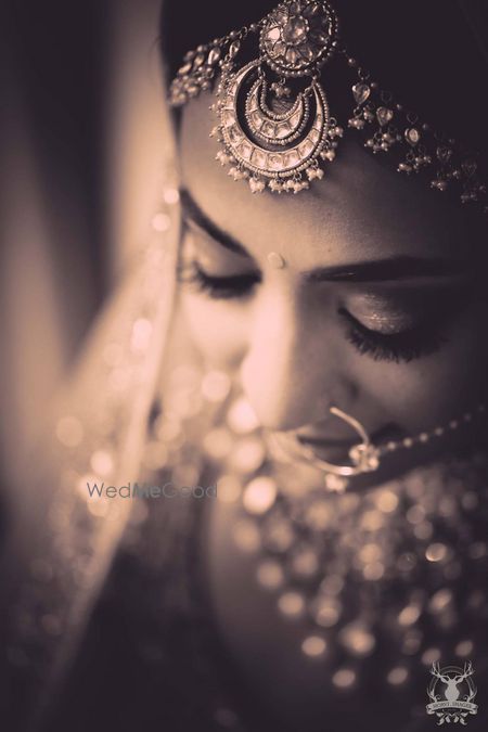 Sepia tone bridal portrait with mathapatti 