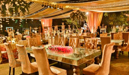Glamorous reception table seating in gold