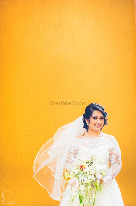 Christian Bride Shot with Floral Bouquet