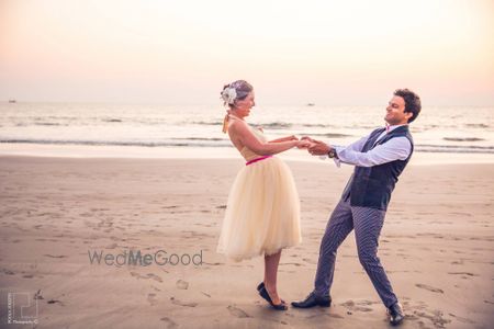 Bride on Toes Couple Shot at the Beach