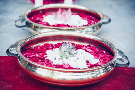 Photo of Silver Water Bowls with Rose Petals