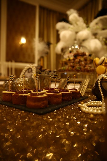 Gold Shimmer Table Decor with Desserts
