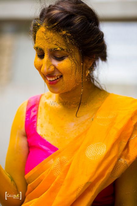 Happy and a beautiful bride on her Haldi ceremony. 