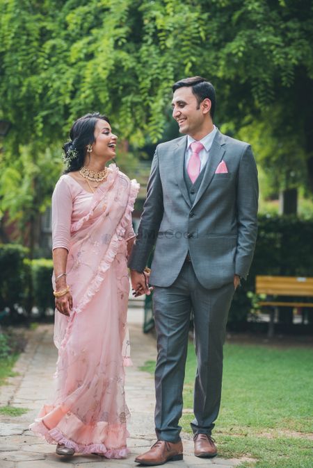 light pink engagement saree with ruffles