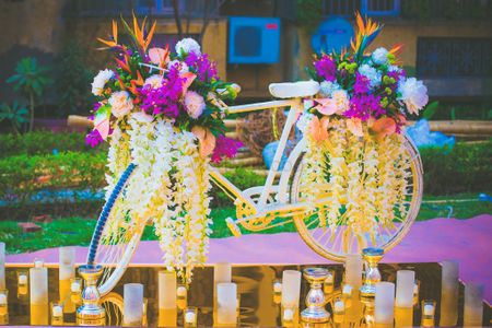 Photo of Gold Bicycle with Floral Decor