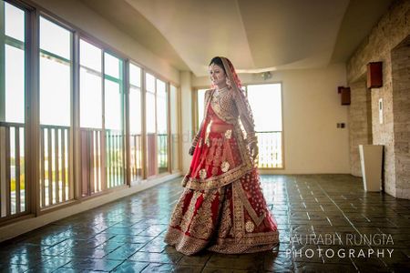 Red and Gold Twirling Lehenga Shot