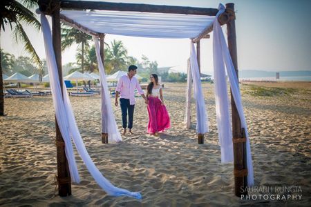 Pre-Wedding Shot Under Shacks at the Beach