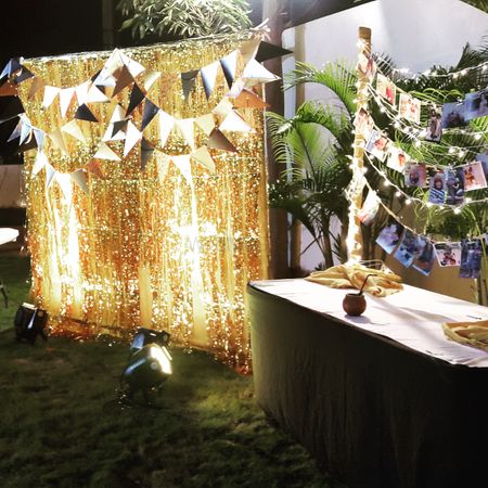 Photo Display with Fairy Lights and Paper Buntings