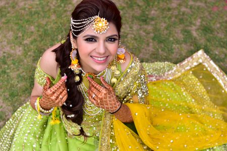 Photo of  Happy Bride to be on mehendi day