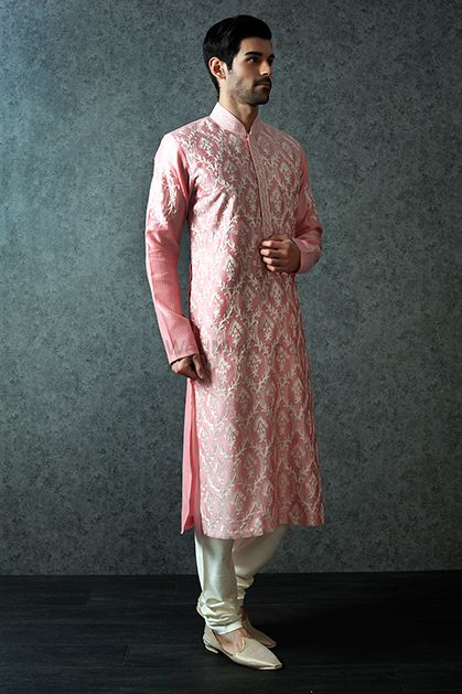 Photo of Pink threadwork sherwani with churidar