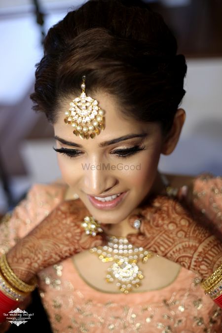 Photo of Kundan Maangtikka with Gold Leaf Drops