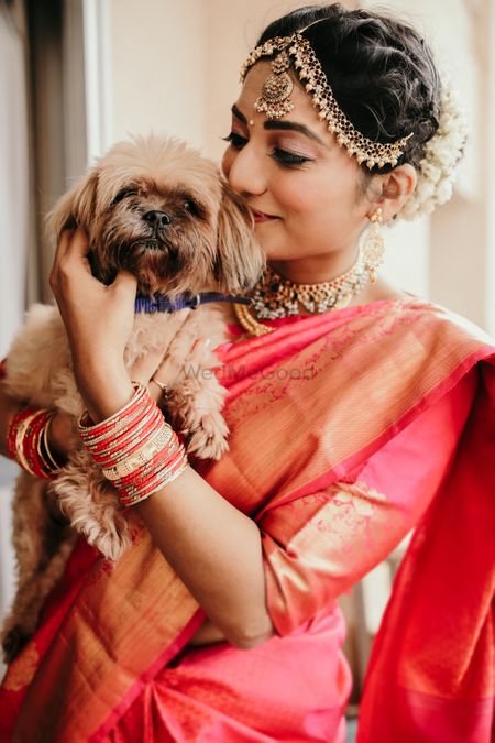 Photo of bride in saree with her dog