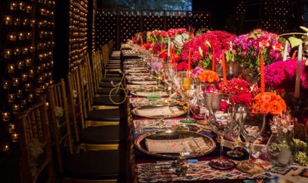 Photo of Floral table settings at reception dinner