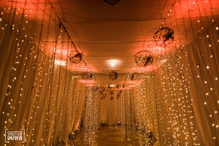 cocktail or sangeet entrance decor idea with fairy lights