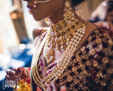 Photo of bridal necklace layering with shorter and rani haar