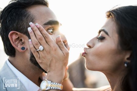 cute and fun pre wedding shoot pose idea