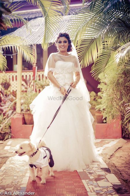 Photo of White Christian Bride with Pet Shot