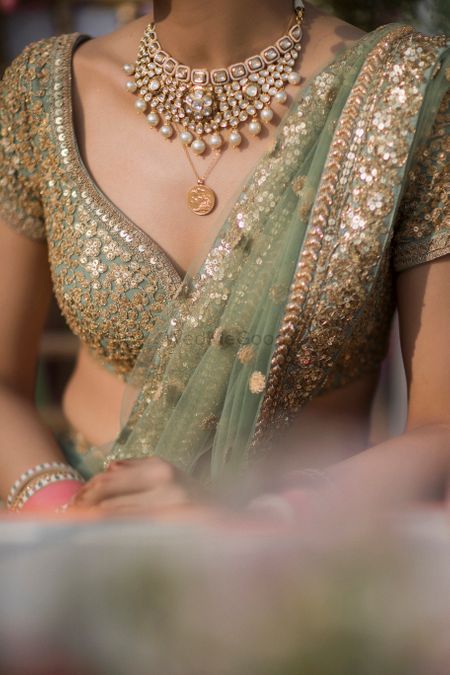 simple layered bridal necklace and blouse