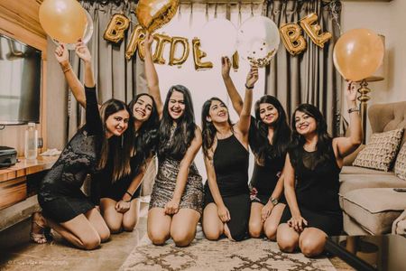 bachelorette party decor in black and gold 