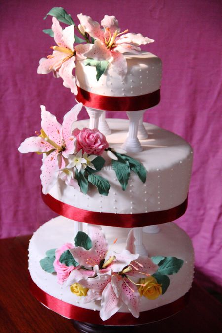 White and Red Cream 3 Tier Wedding Cake