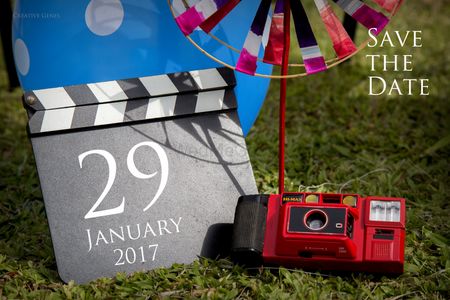Save the date card with camera and clapboard