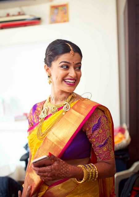 South Indian Bride in Yellow and Purple Saree